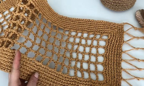 Top view of crochet table runner made with paper yarn