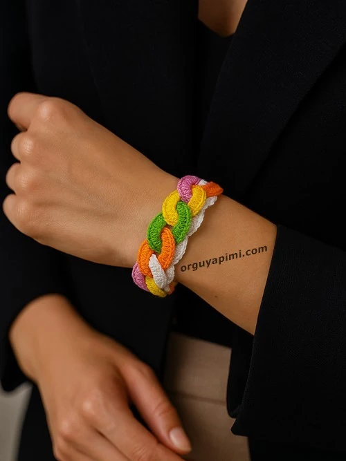 Handmade crochet ring bracelet styled on wrist.